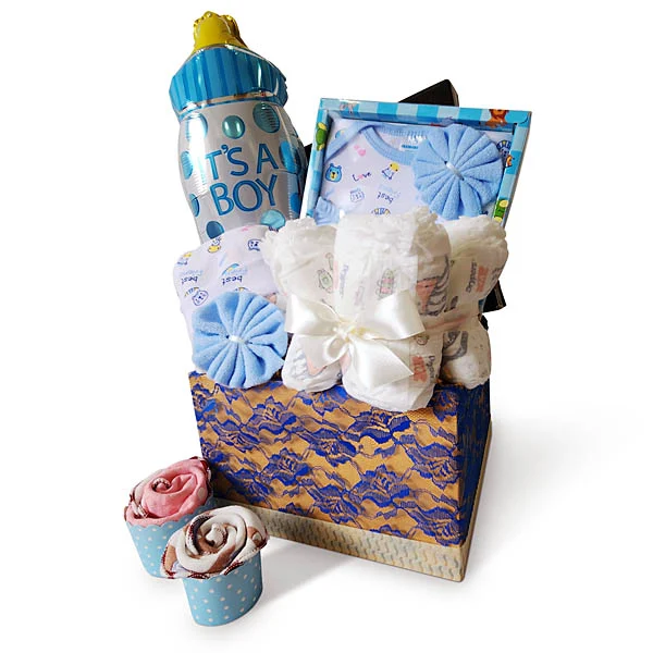 New Arrival newborn baby gift hamper with baby clothes, Drypers diapers, cupcake towels and It's A Boy balloon for baby shower gifts in Malaysia.