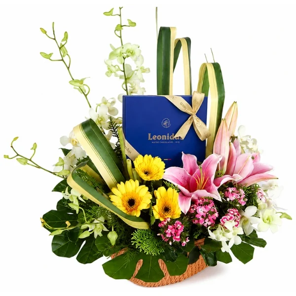 Leonidas Belgian Chocolate Gift Basket with Lilies Orchids and Gerberas. Same-day delivery in Klang, Setia Alam, Sunway, Kota Damansara and throughout Klang Valley.