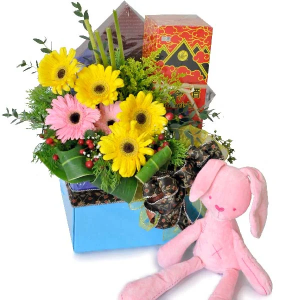 New mother and baby gift hamper with Yomeishu Health Tonic, pink bunny plush and fresh gerbera flowers.