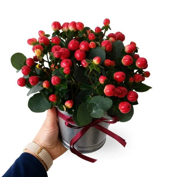 Red berry and eucalyptus flower arrangement