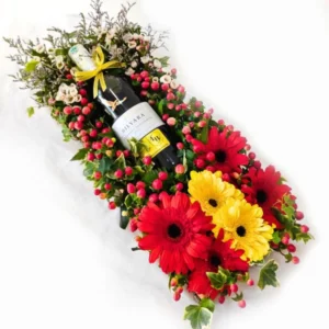 Wolf Blass Bilyara Shiraz wine gift with Gerberas and red berries