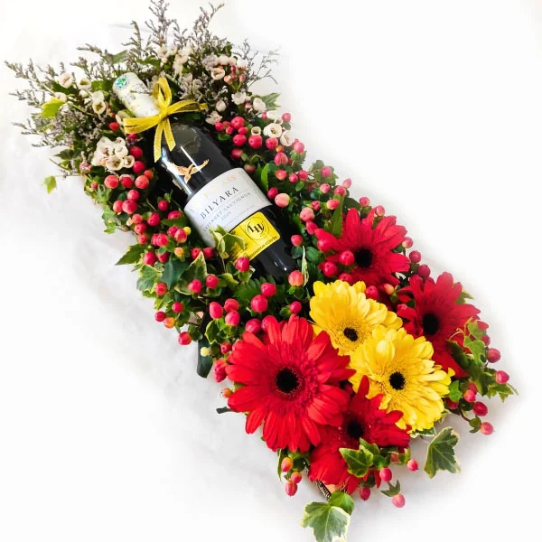 Wolf Blass Bilyara Shiraz wine gift with Gerberas and red berries