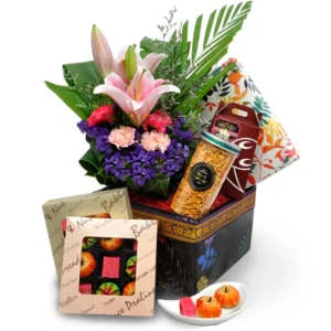 Isthuthi Deepavali sweets gift hamper with fresh flowers and traditional Indian sweets
