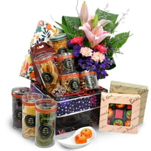 Lassana Deepavali Indian sweets and savouries hamper with Stargazer Lilies and Statice flowers