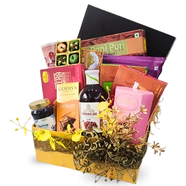 Indian Deepavali hamper with organic pomegranate juice, Godiva and Lindt chocolates and Indian snacks